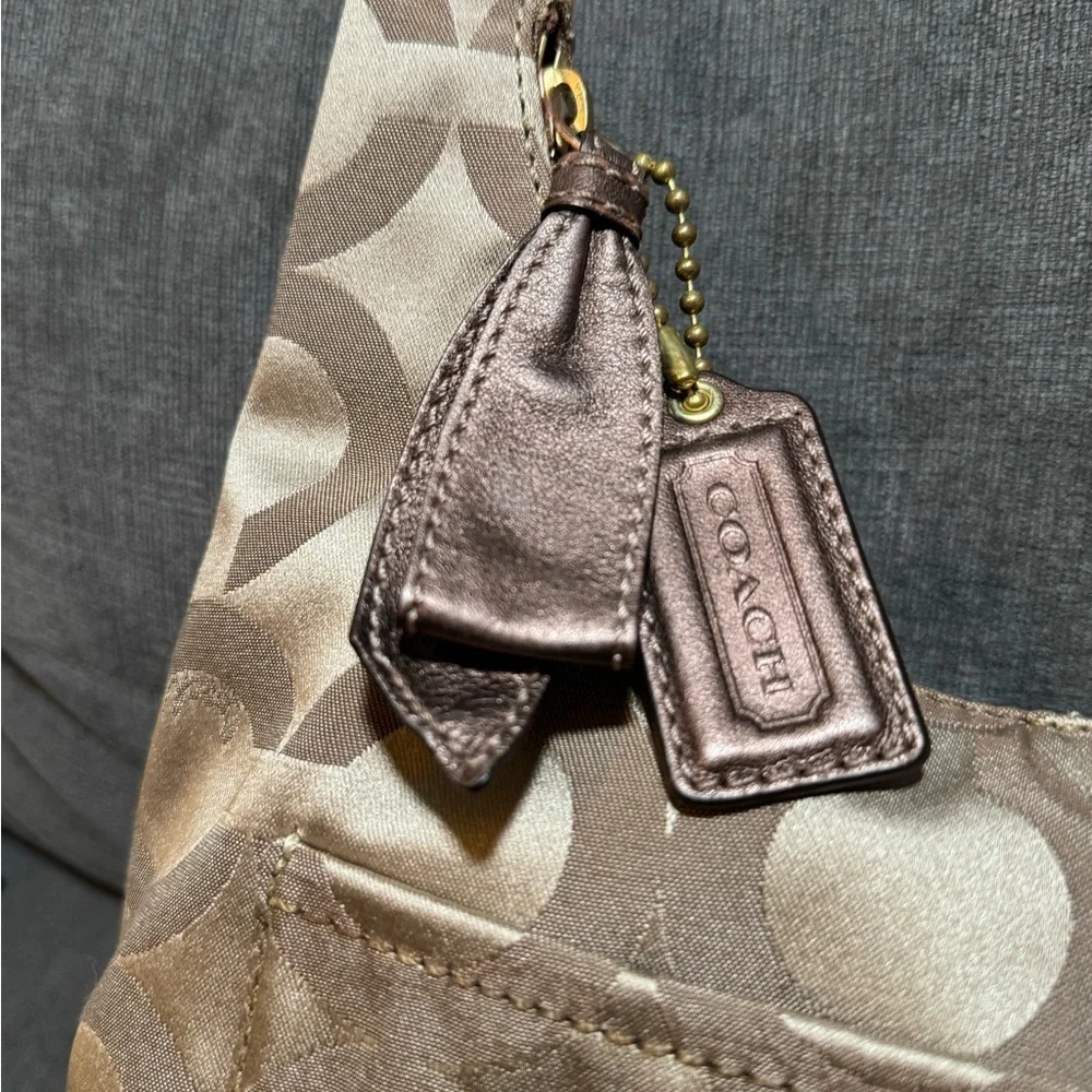 Coach Brown Signature One Shoulder Hobo Bag with bronze leather